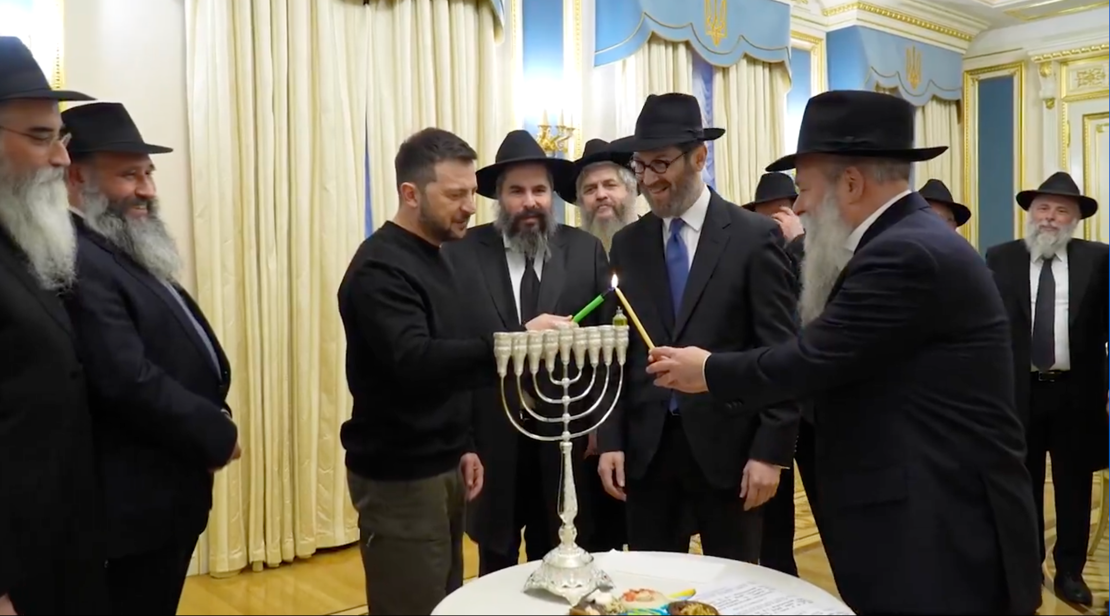 Using menorah from Argentina’s Milei, Volodymyr Zelensky lights Hanukkah candles with Ukrainian rabbis